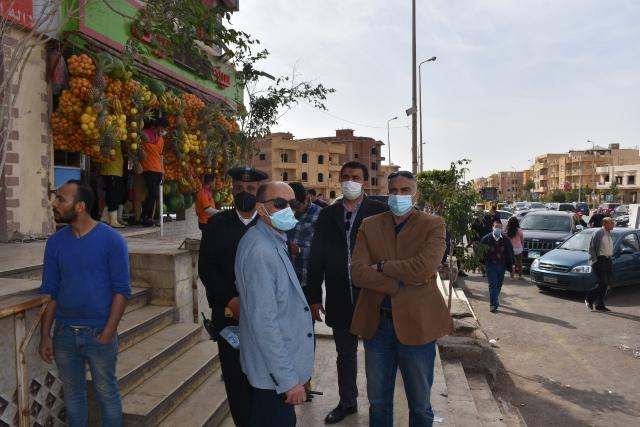 حملة مكبرة على الإشغالات والتعديات بمركز خدمات البنفسج بالتجمع الأول بمدينة القاهرة الجديدة